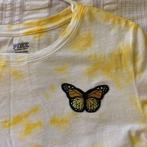 yellow tie dyed shirt with patched on butterfly, size SM